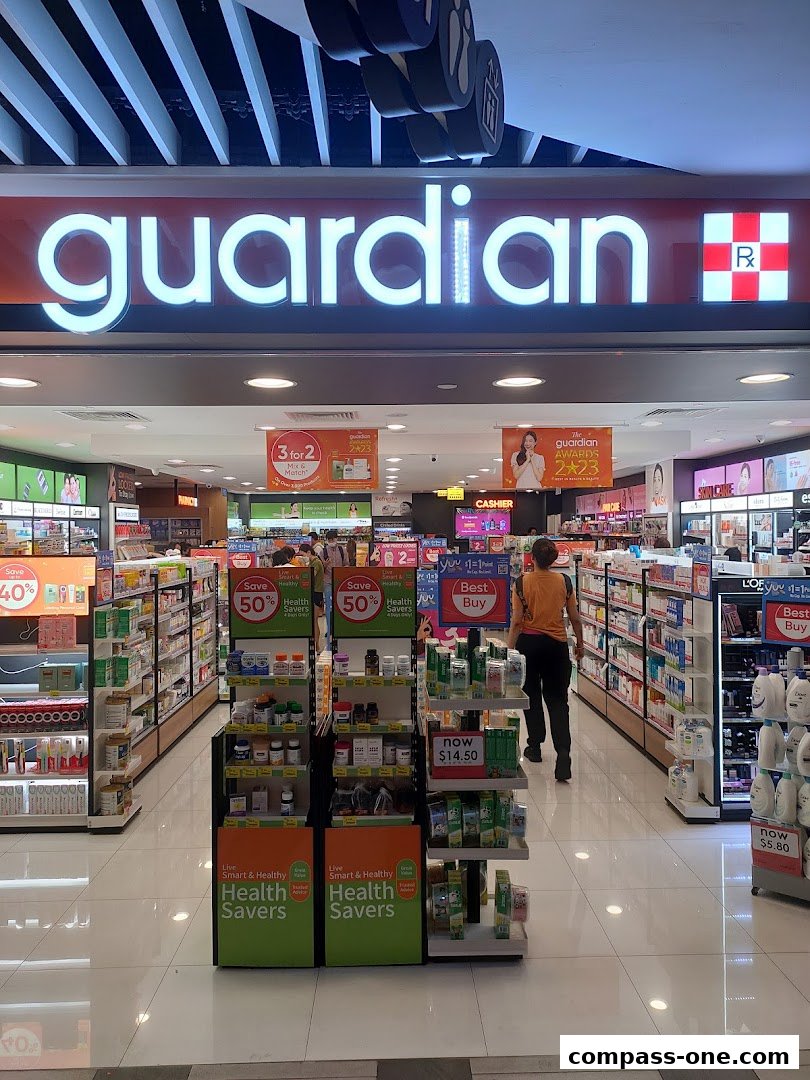 The interior of a Guardian Health & Beauty store with shelves stocked with health and beauty products.