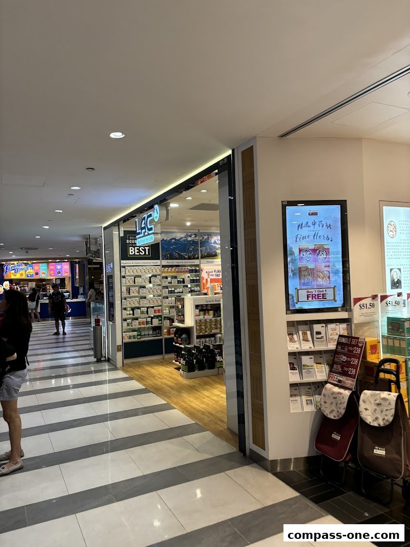 The entrance to LAC Nutrition For Life, a health and wellness store, showcasing various supplements and health products.