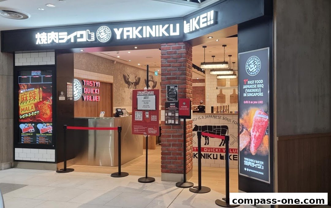 The exterior of a Yakiniku Like restaurant with its prominent signage and inviting interior visible.