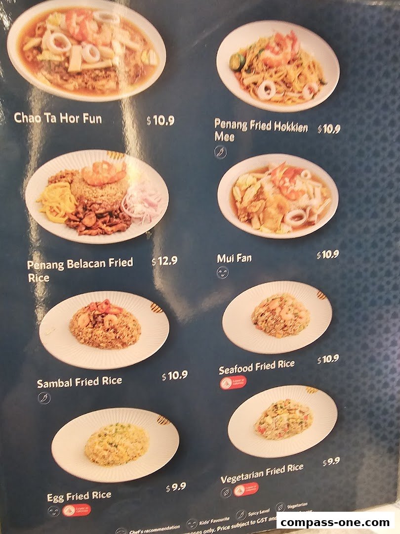 A menu board displaying various Penang-style dishes with prices.