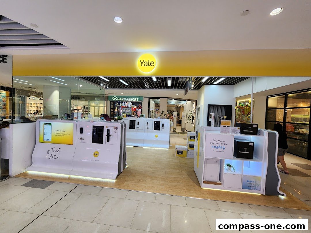 The Yale Smart Shop features modern display units showcasing smart locks and home security solutions.