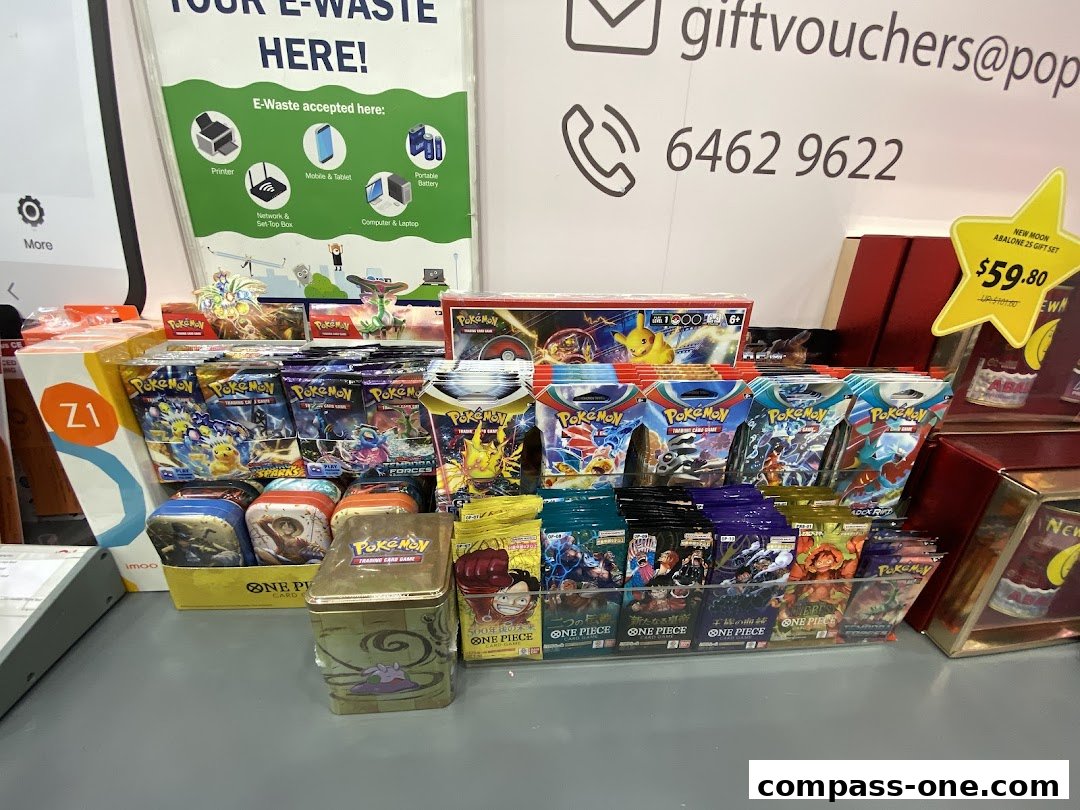 A display of Pokémon and One Piece trading card packs and gift sets at a store.