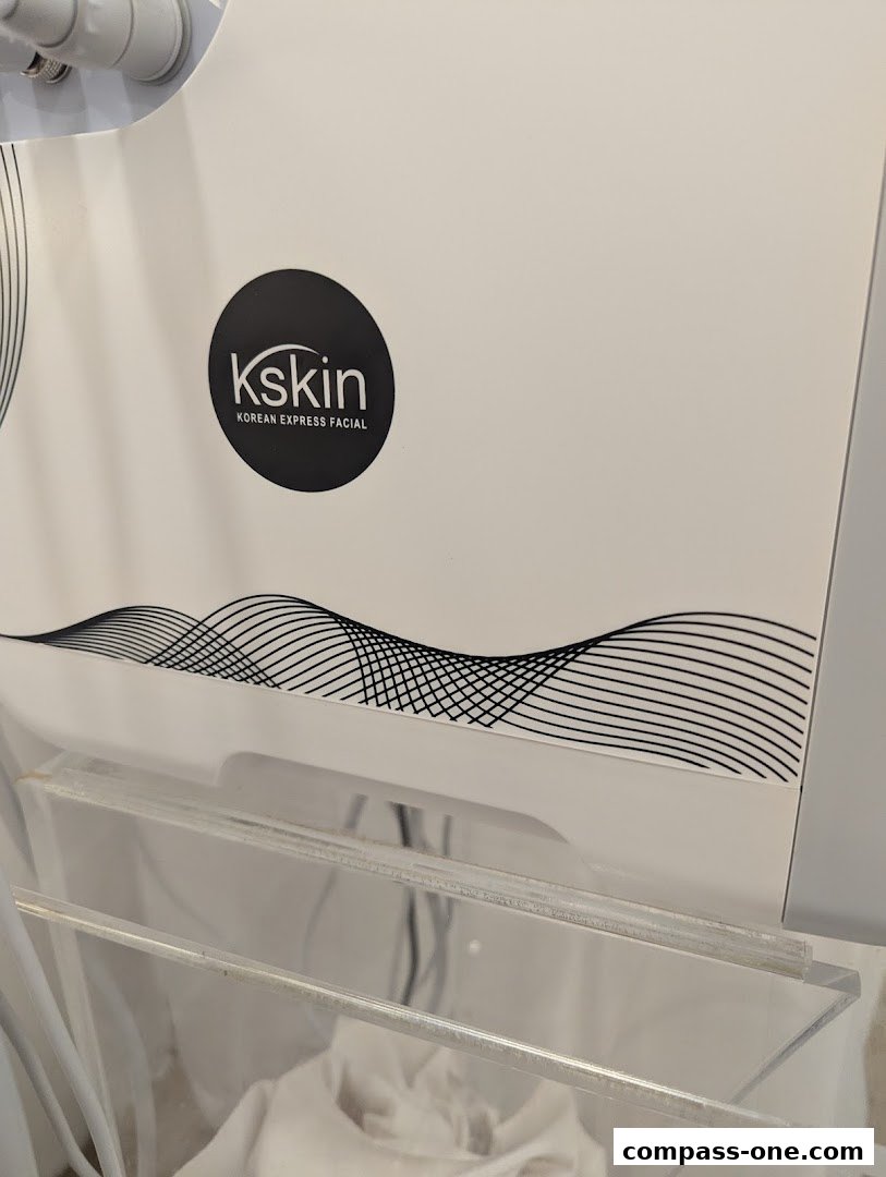 Close-up of a Kskin Korean Express Facial machine with its logo.