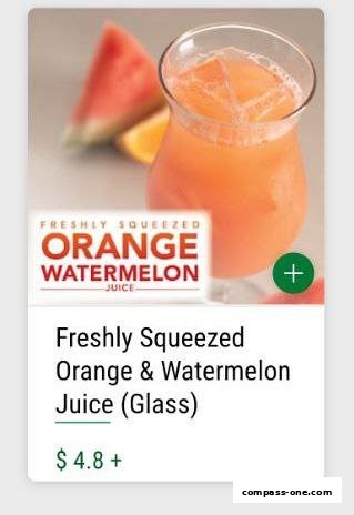 A refreshing glass of freshly squeezed orange and watermelon juice.