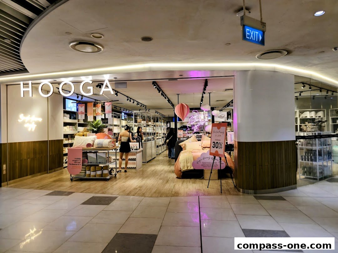 The HOOGA store entrance showcases bedding and home decor with a 30% off sale sign.