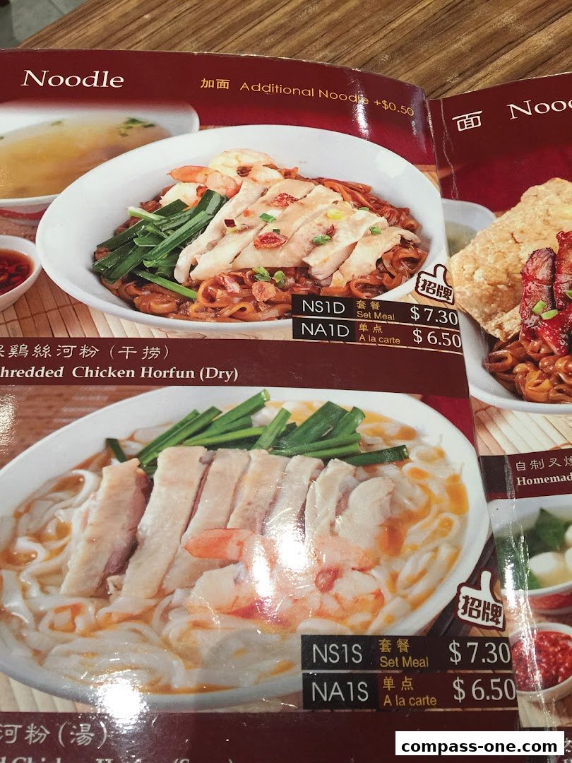A menu featuring noodle dishes with chicken and shrimp, including prices for set meals and a la carte options.