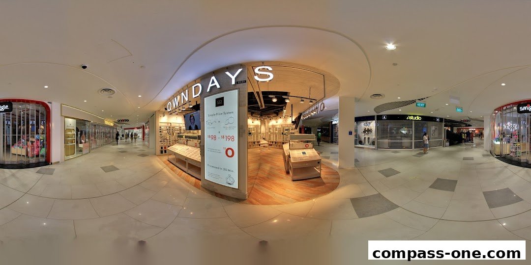 The OWNDAYS Compass One store features a modern interior with a wide selection of eyewear and a clear pricing system.