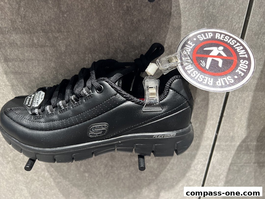 A black Skechers shoe with a slip-resistant sole tag is displayed.
