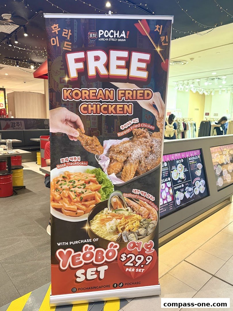 A promotional banner for POCHA! Korean Street Dining offering free Korean fried chicken.