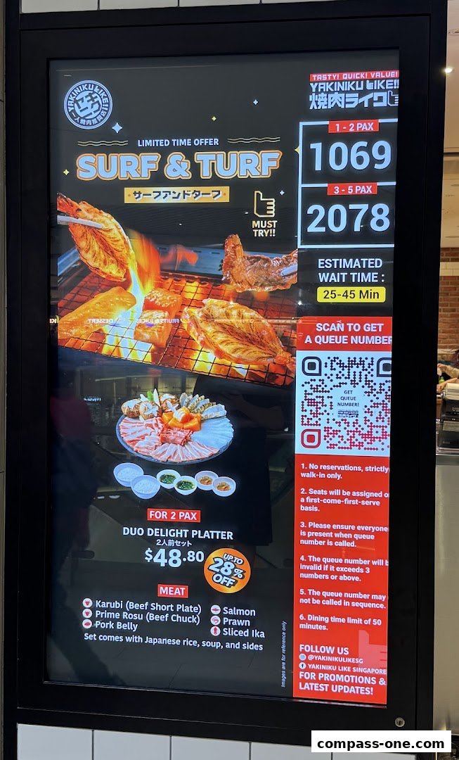 A digital menu board for Yakiniku Like, showcasing a Surf & Turf special and a Duo Delight Platter.