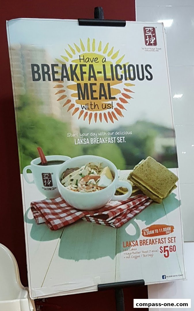 A promotional poster for Ya Kun Kaya Toast's Laksa Breakfast Set.