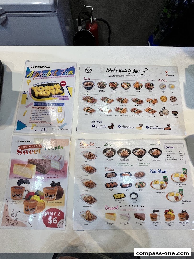 A display of Yoshinoya's menu featuring various Japanese dishes, desserts, and drinks.