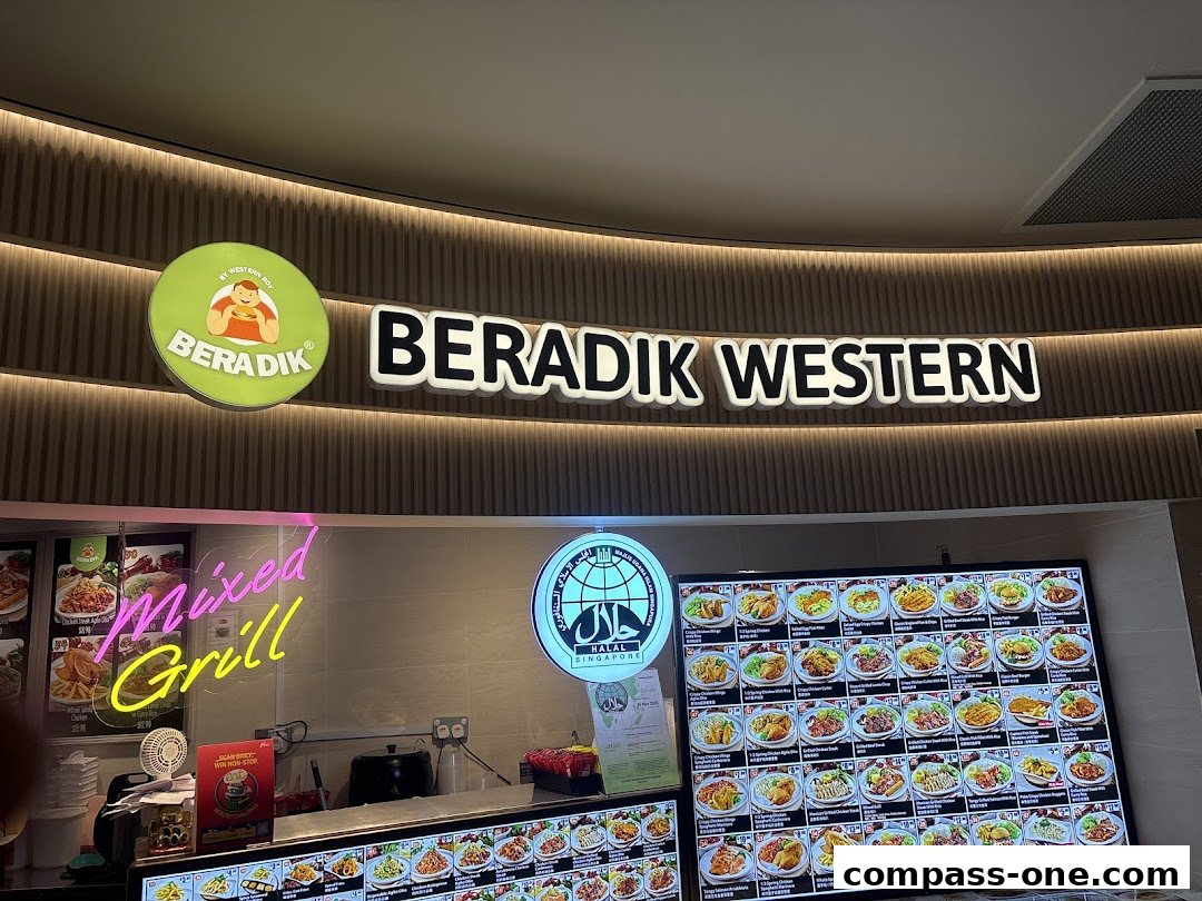 A brightly lit food stall with a large menu display and prominent signage for 'BERADIK WESTERN'.
