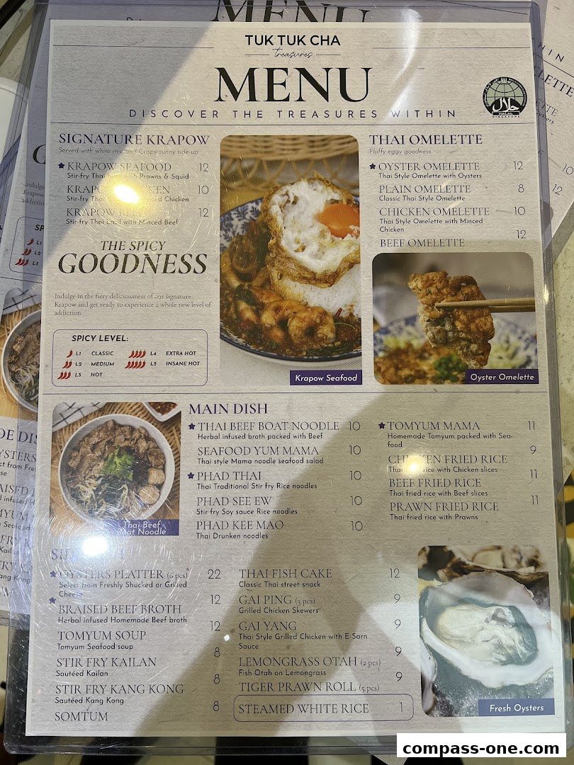 A menu from Tuk Tuk Cha Treasures featuring Thai dishes like Krapow and Omelettes.
