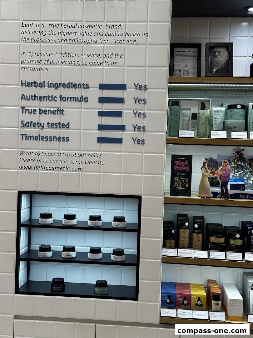 A display of belif cosmetic products with information about herbal ingredients and benefits.