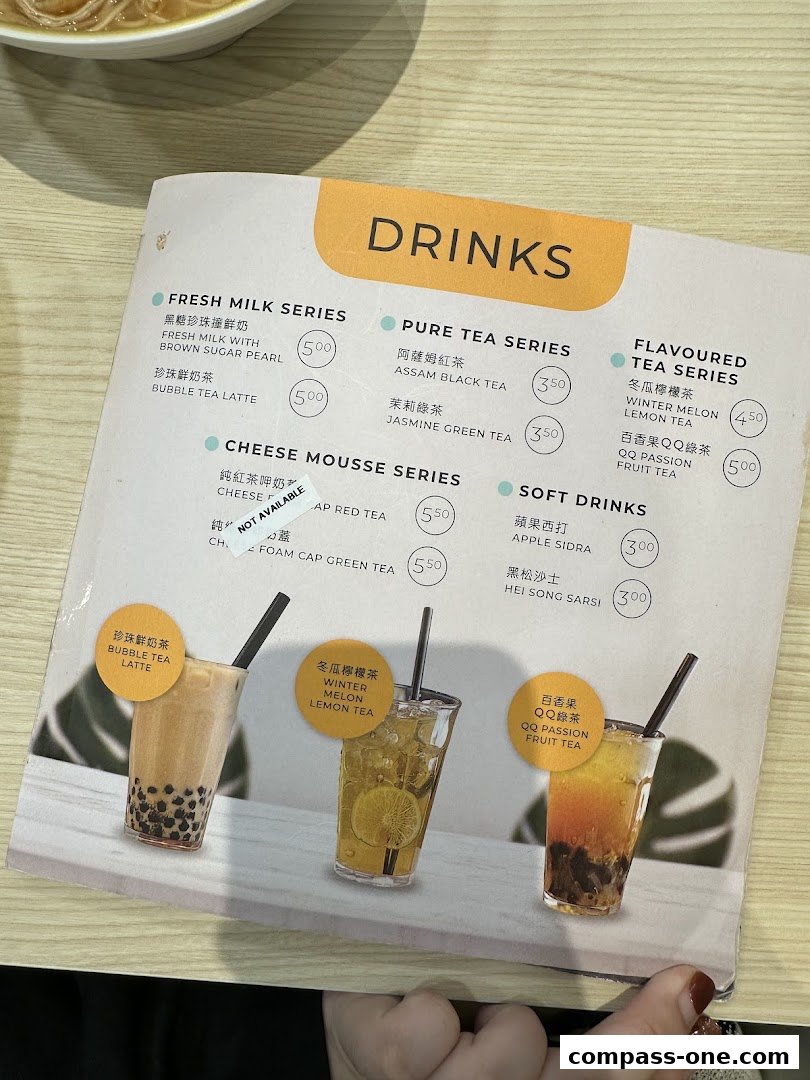 A menu featuring various drink categories like Fresh Milk, Pure Tea, Flavoured Tea, Cheese Mousse, and Soft Drinks.