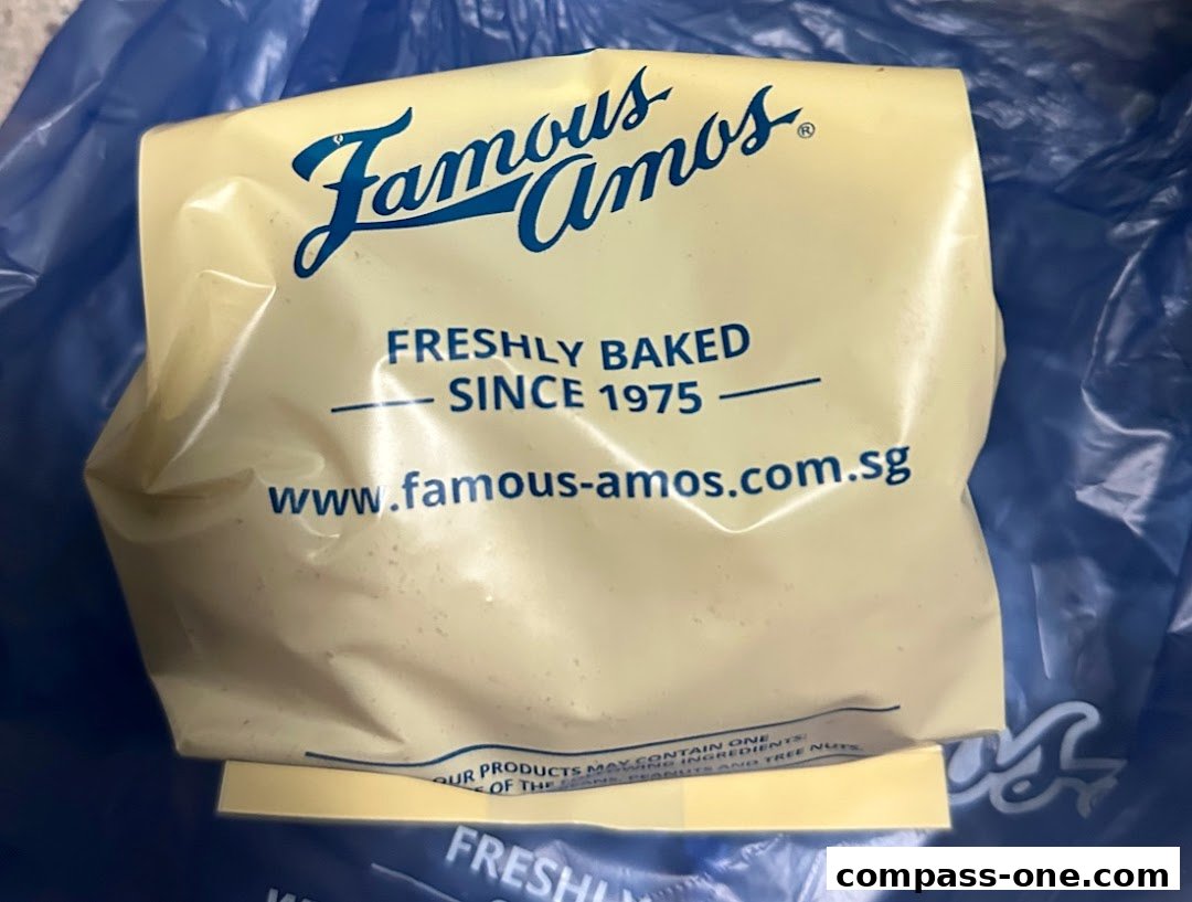 A Famous Amos cookie bag with the brand logo and website.