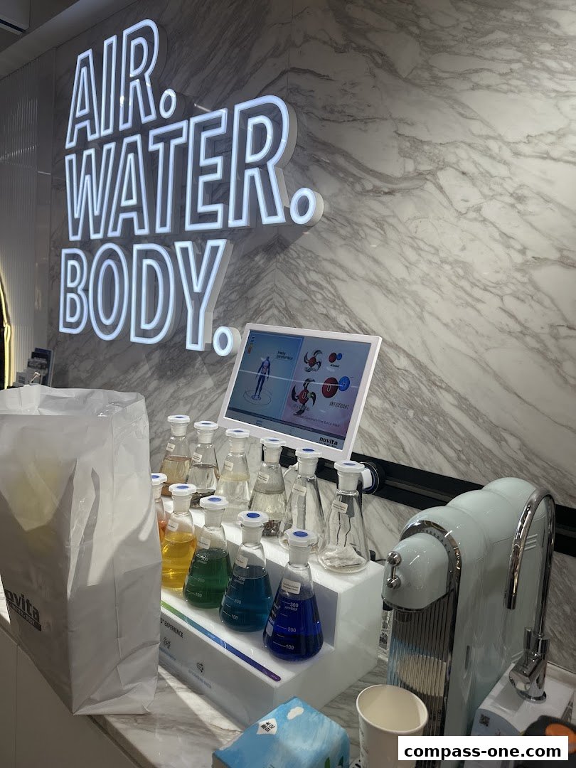 Novita store display with colorful liquids in beakers and a water dispenser.