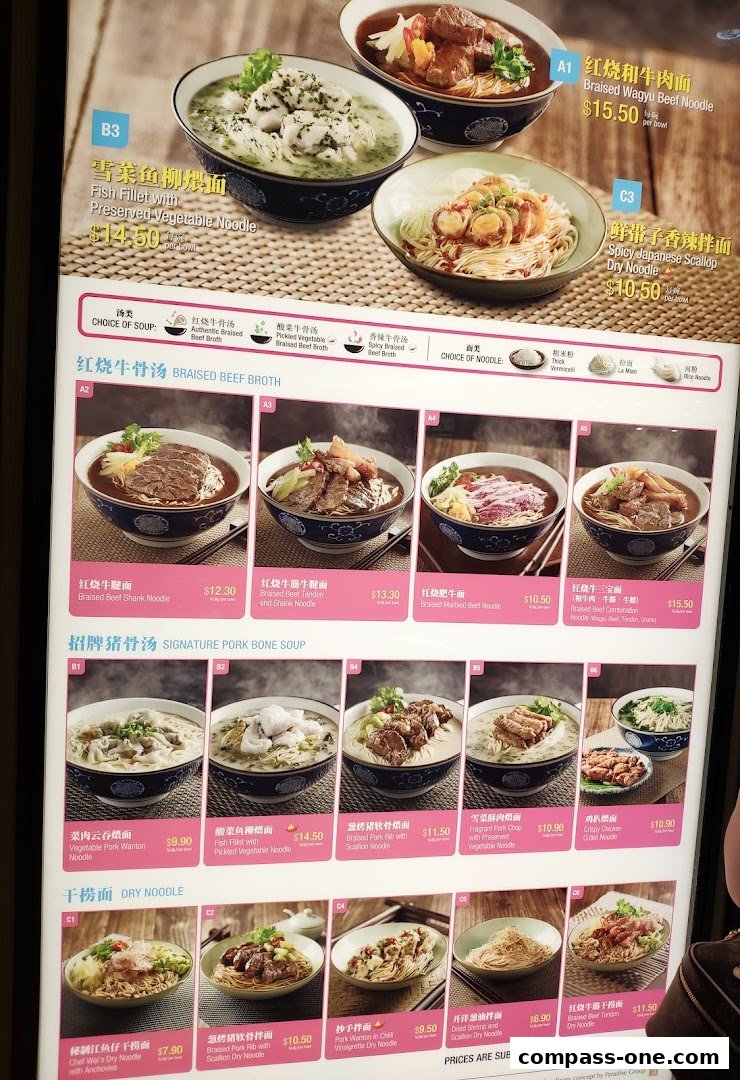 A menu board showcasing various noodle dishes with appetizing images and prices.