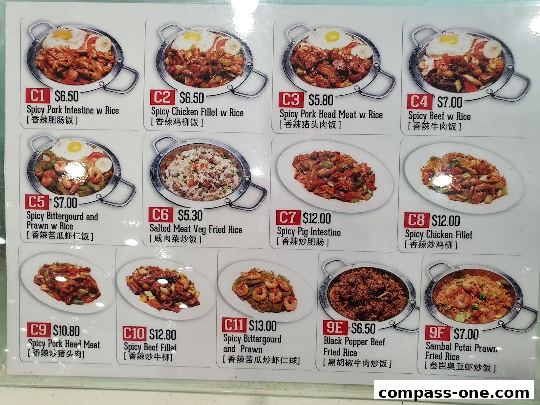 A menu displaying various rice dishes with meat and vegetables, including prices.