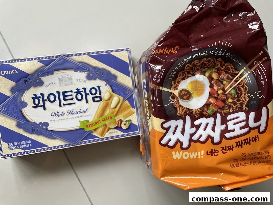 A box of Crown White Hazelnut wafers and a bag of Samyang Jjajangmyeon noodles.