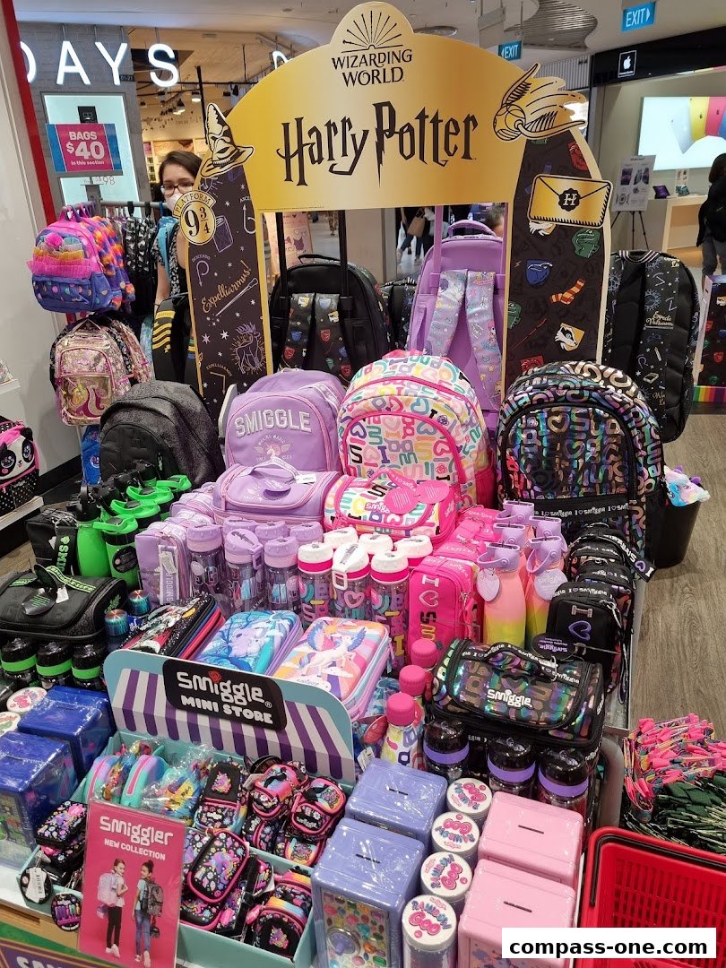 A colorful display of Smiggle backpacks, pencil cases, and water bottles, featuring Harry Potter designs.