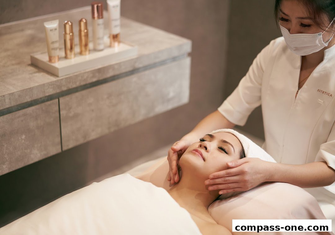 A beautician performs a facial treatment on a client at Estetica Beauty.