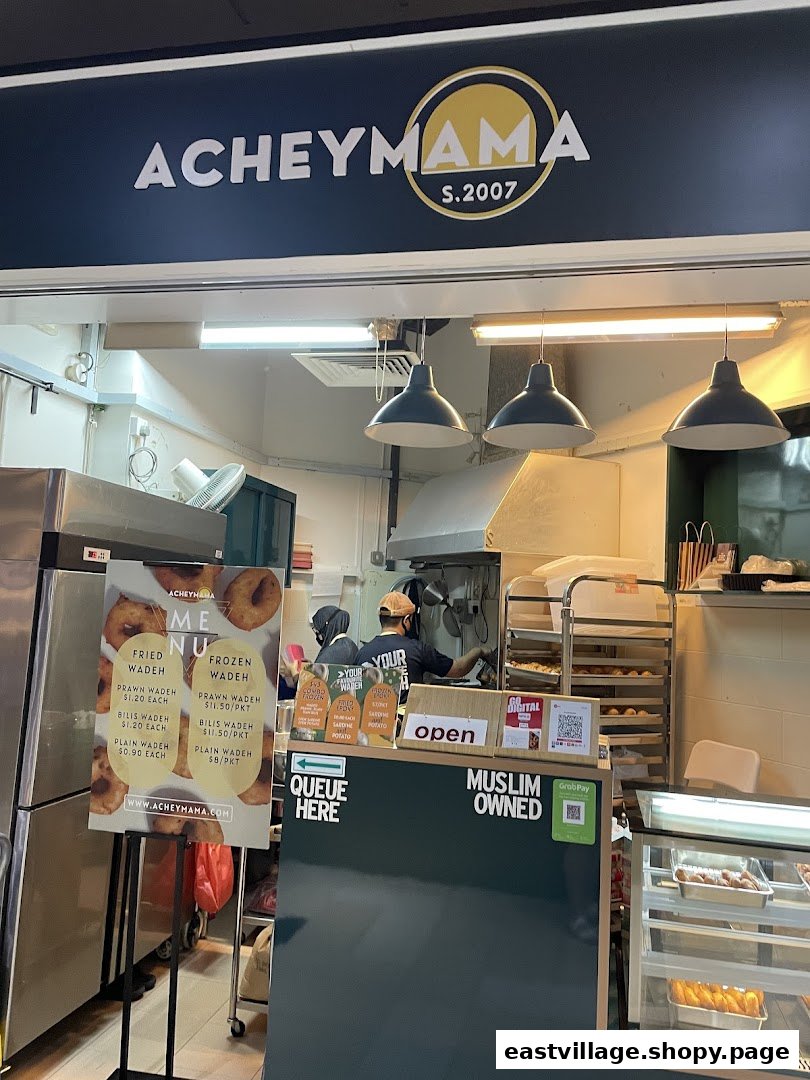 Acheymama shop front displaying its menu of fried and frozen wadeh.