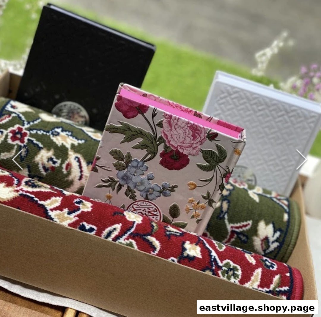 A gift box featuring prayer mats and Islamic books, perfect for thoughtful giving.