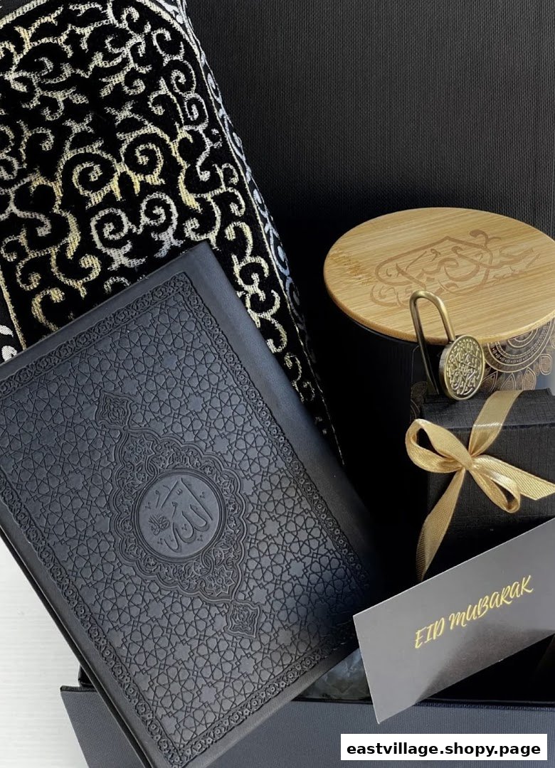 A beautifully arranged Islamic gift set featuring a Quran, prayer mat, and other elegant items.