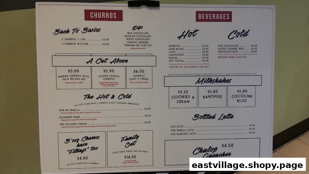 A detailed menu board displaying churros, dips, beverages, milkshakes, and lattes.