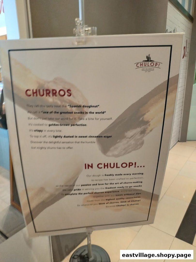 A promotional standee for Chulop! by The Syarifs, detailing the appeal of their churros.