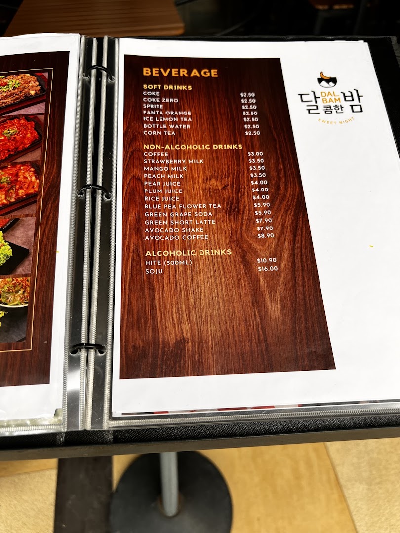 A page from Dalcomhan Bam Korean Restaurant's beverage menu, featuring soft drinks, non-alcoholic, and alcoholic options.