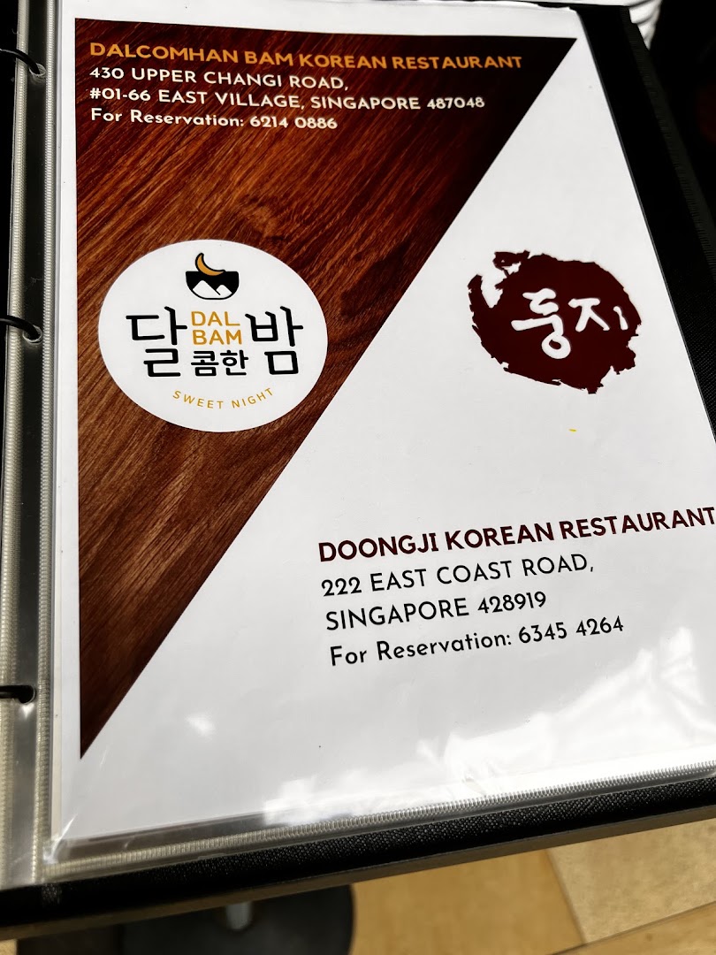 A menu page displaying contact information for Dalcomhan Bam and Doongji Korean Restaurants.