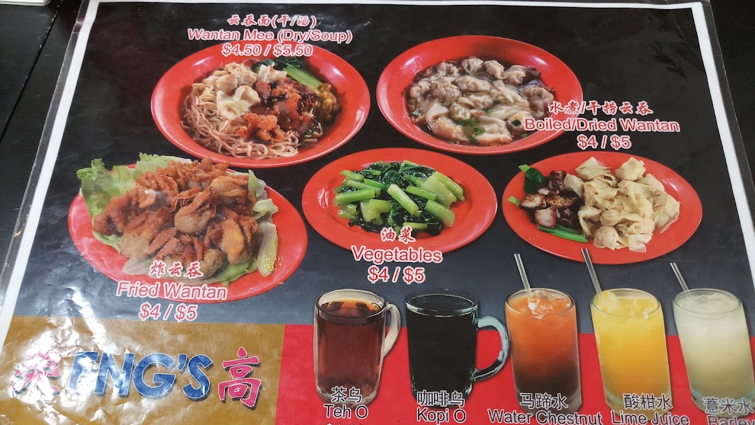 A vibrant menu board showcasing delicious Wantan Mee, fried wantans, vegetables, and refreshing beverages.