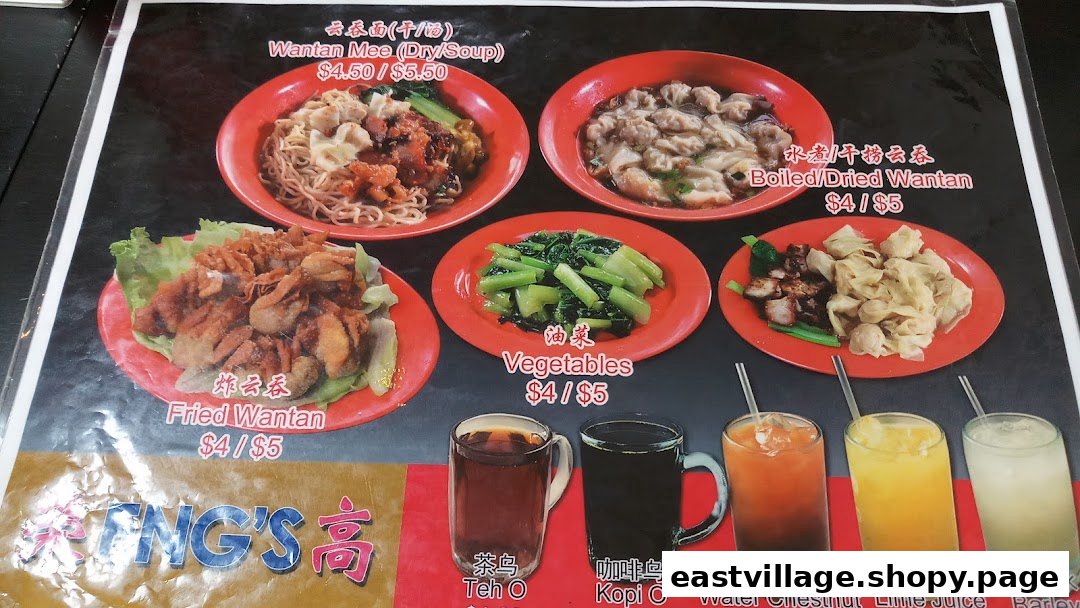 A vibrant menu board showcasing delicious Wantan Mee, fried wantans, vegetables, and refreshing beverages.