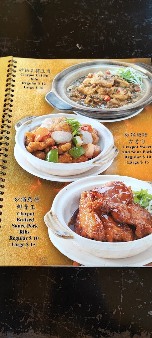 A close-up of a menu page displaying three claypot dishes with their names, descriptions, and prices.