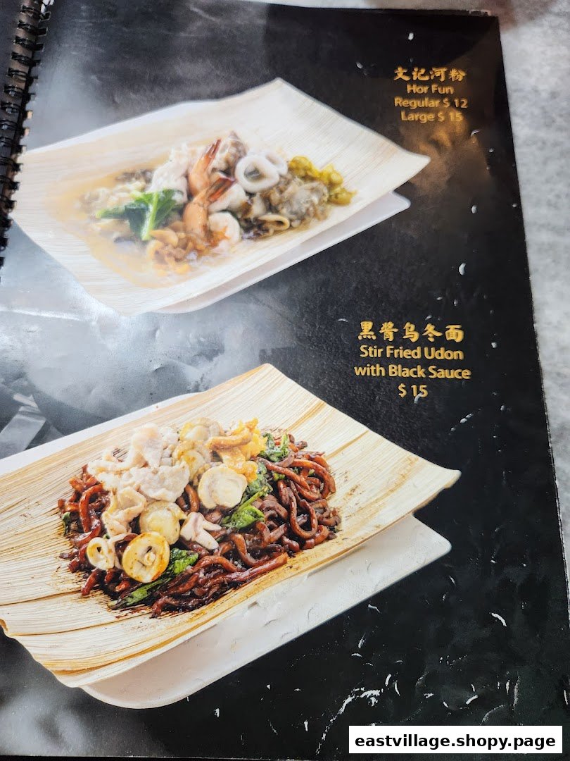 A menu page displaying two noodle dishes: Hor Fun and Stir Fried Udon with Black Sauce.