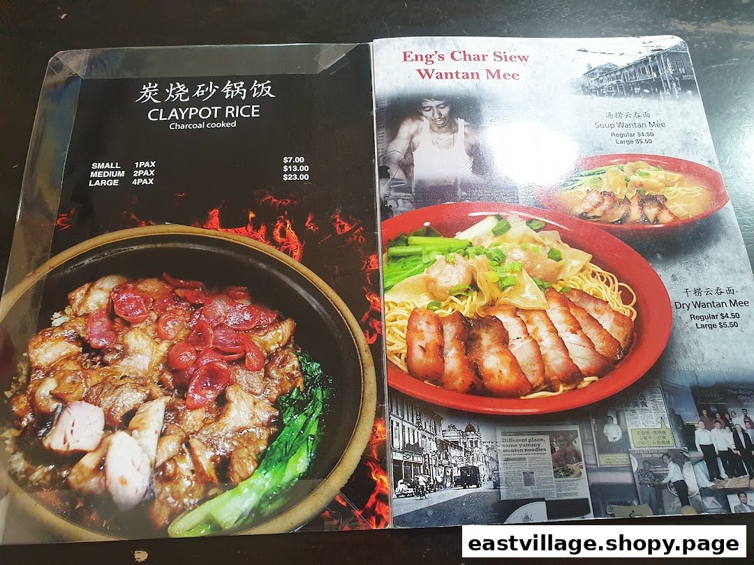 An open menu displaying Claypot Rice and Eng's Char Siew Wantan Mee with prices and sizes.