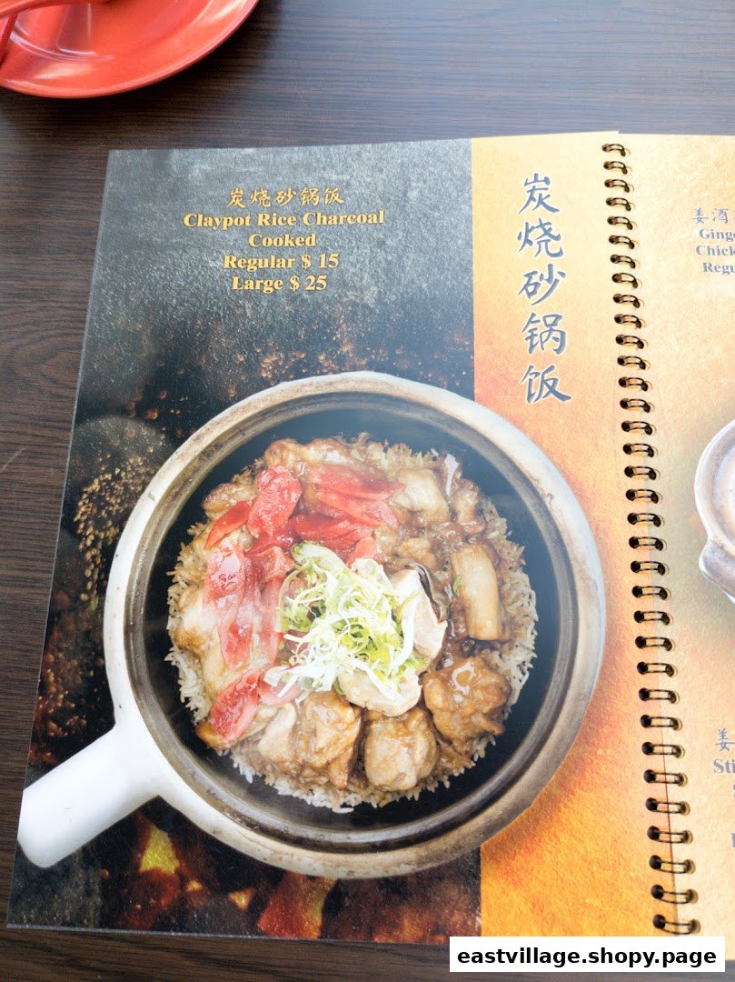 A menu page displaying a delicious Claypot Rice Charcoal Cooked dish with pricing options.
