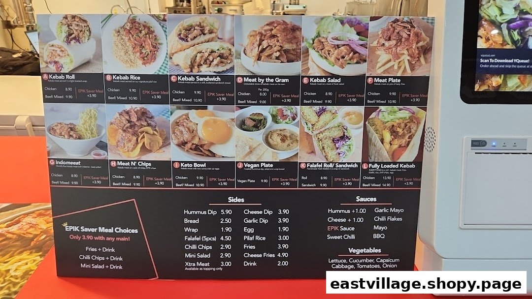 A vibrant menu board displaying various kebab dishes, sides, and sauces with prices and images.