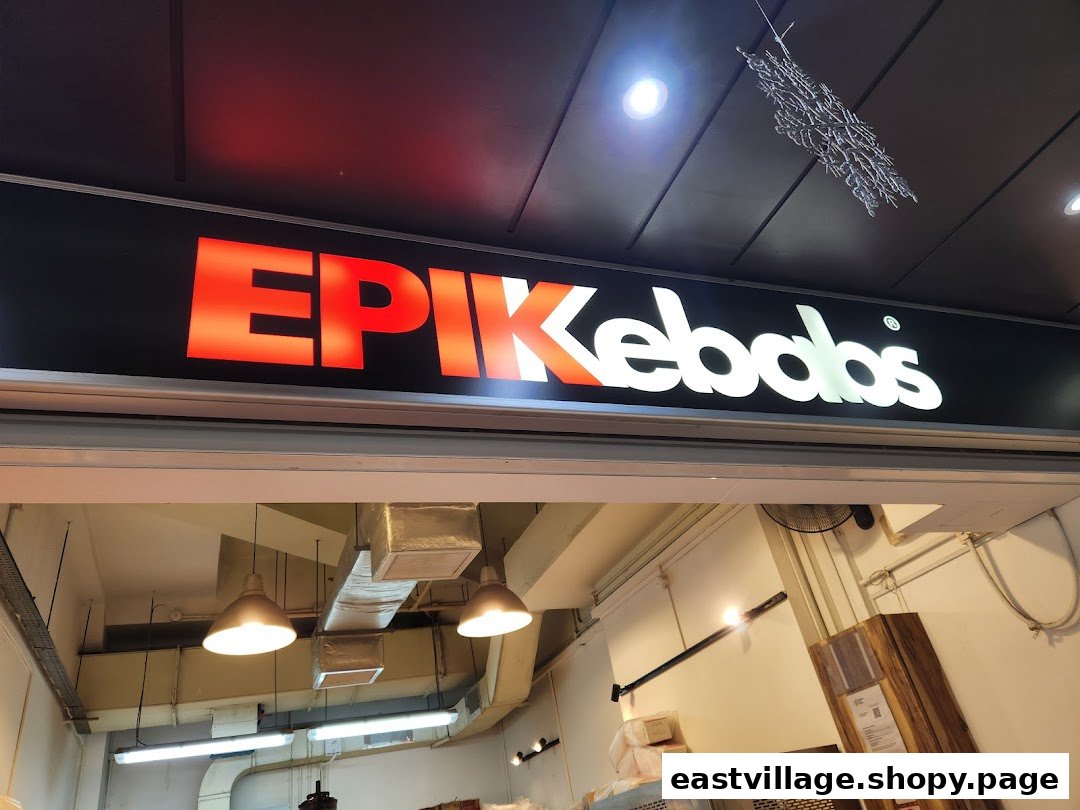 A bright, illuminated sign for 'EPIKebabs' above the shop entrance.