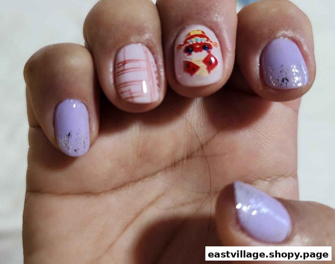 Close-up of a hand showcasing beautifully manicured nails with lavender polish and intricate designs.
