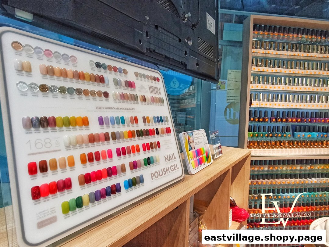 A vibrant display of numerous nail polish colors and gel options inside EV Nail Salon.