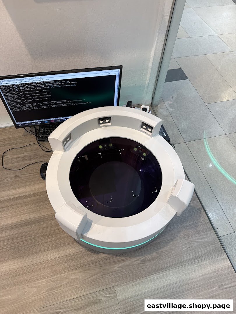 A modern foot scanning device with a computer monitor, likely for custom insole creation.