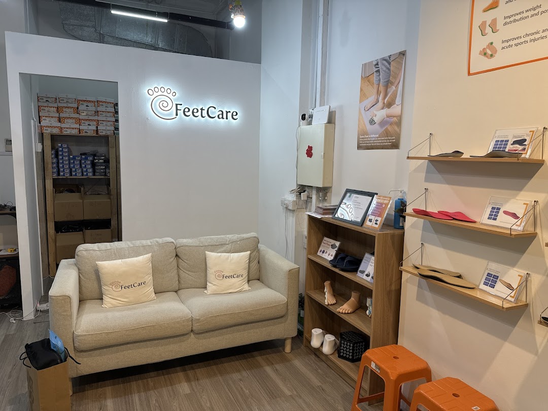 An inviting interior of FeetCare, featuring a comfortable waiting area and displays of foot care products.