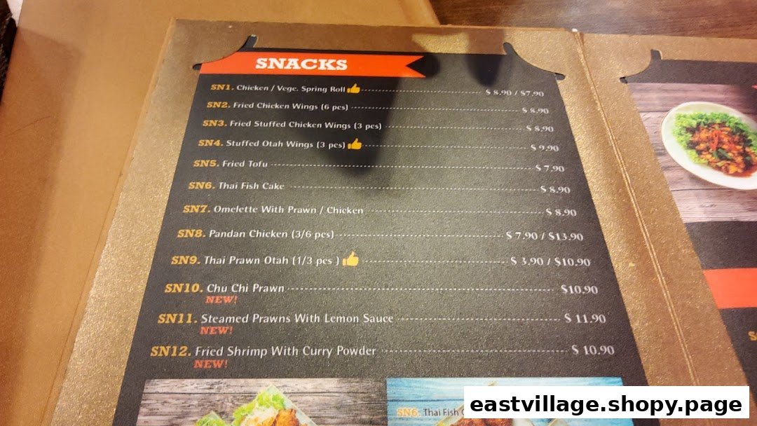A close-up view of the 'Snacks' section from GreaThai's menu, featuring various Thai appetizers.