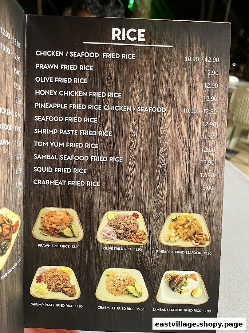 A menu page from GreaThai showcasing a variety of fried rice dishes with prices and accompanying images.