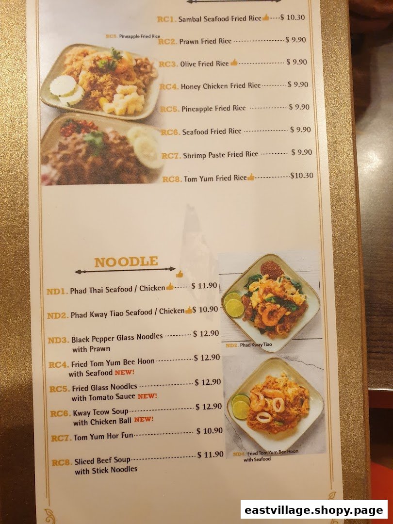 A close-up view of GreaThai's menu, showcasing a variety of fried rice and noodle dishes with prices.