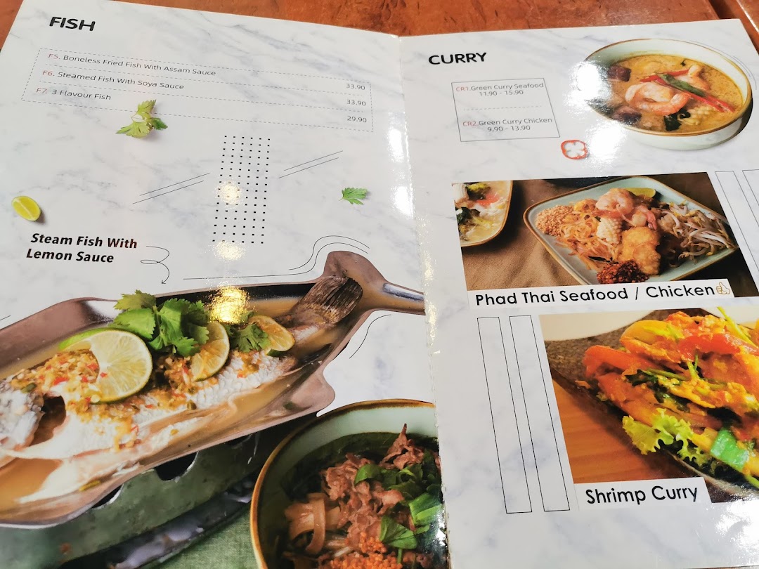 A close-up view of GreaThai's menu, showcasing various Thai fish, curry, and noodle dishes with prices.